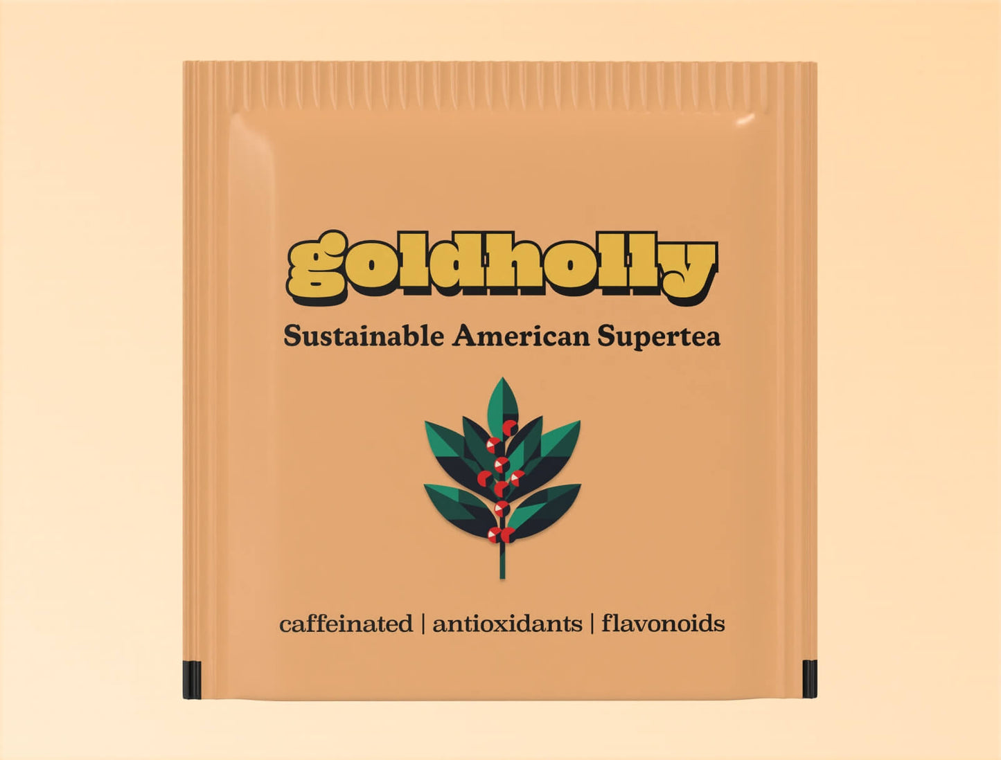 Individual tan-colored teabag packaging for Goldholly yaupon tea. The sachet features the yellow Goldholly logo at top, 'Sustainable American Supertea' tagline, and a geometric illustration of a yaupon holly branch with green leaves and red berries. At the bottom is the text 'caffeinated | antioxidants | flavonoids' describing the tea's properties.