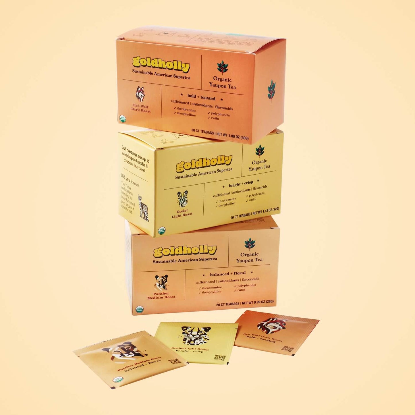 Goldholly three-roast bundle pack stacked to showcase endangered species conservation panels featuring ocelot, panther, and red wolf illustrations. Each purchase supports American wildlife while enjoying sustainable and regenerative native caffeine.