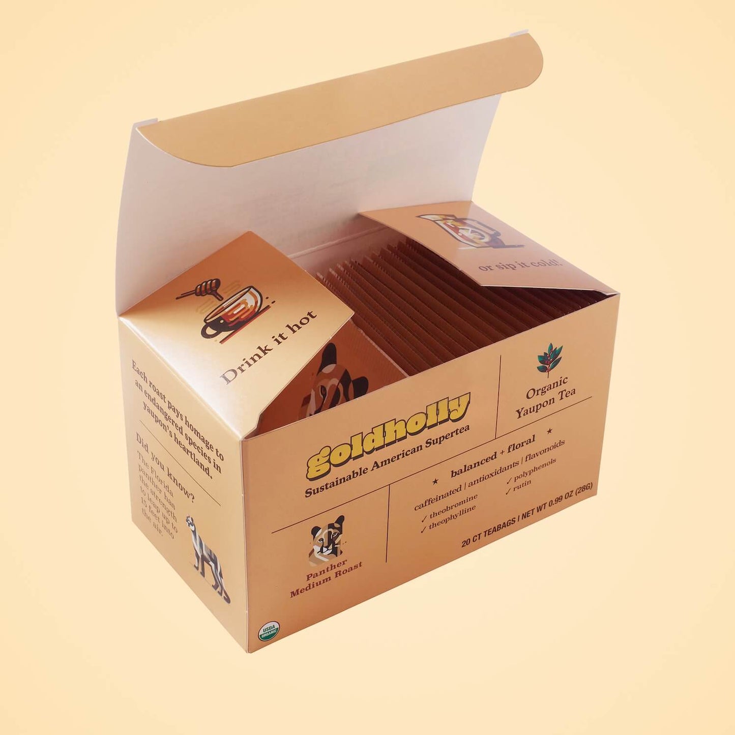 Opened Goldholly Panther Medium Roast box displaying organized teabag packets with instructional messaging, showcasing thoughtful packaging design for premium organic yaupon tea.