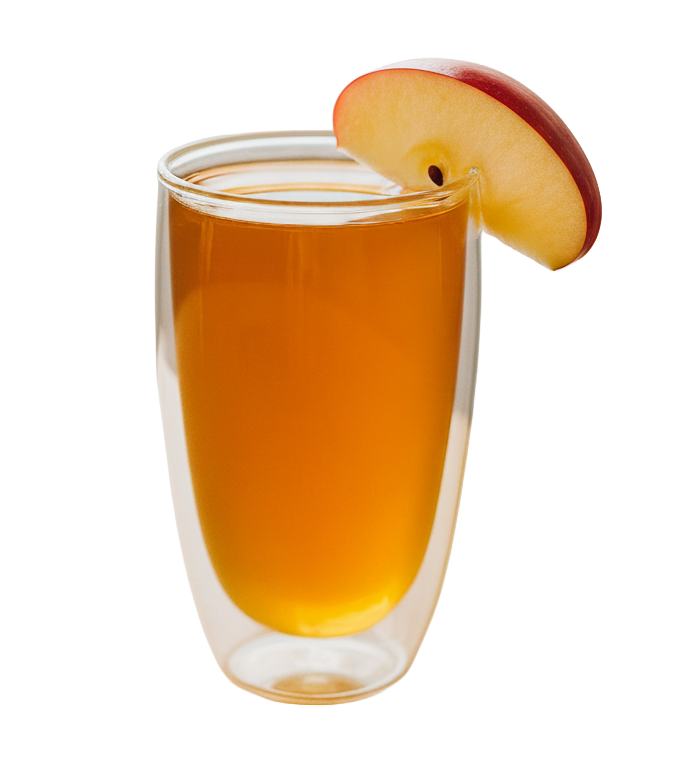 Steaming mug of Goldholly Light Roast yaupon tea infused with apple and honey, showing warm amber color and comforting fall beverage presentation for seasonal caffeinated drink